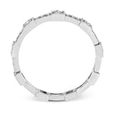 This white gold band form a modern style band set with .33 ctw of striking round cut white diamond accents. Perfect for stacking.