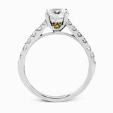 This charming contemporary two-tone wedding set is accented by .66 ctw of glistening round cut white diamonds with .02 ctw round cut yellow diamond accents.