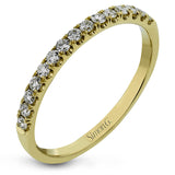 This charming contemporary two-tone wedding set is accented by .66 ctw of glistening round cut white diamonds with .02 ctw round cut yellow diamond accents.