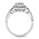 This impressive white gold engagement ring is accented by .23 ctw white round cut diamonds and .20 ctw marquise cut diamonds.