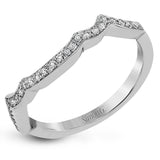 This impressive white gold engagement ring is accented by .23 ctw white round cut diamonds and .20 ctw marquise cut diamonds.