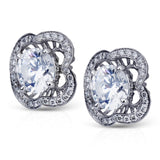 These vintage inspired earring jackets set in 18K white gold featuring .27cttw white diamonds are the perfect enhancement to any stud earring in your jewelry collection.