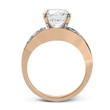 Dramatic and bold, this white gold contemporary engagement ring is accented by 1.87 ctw princess cut white diamonds and 1.67 ctw glistening baguette white diamonds.