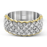 Presenting an arresting design in white gold, this band is set with 2.77 ctw of princess of white diamonds in an eye-catching setting highlighted by yellow gold accents.