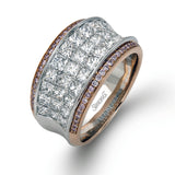 This contemporary two-tone band is set with a triple row of 2.45 ctw princess cut white diamonds silhouetted by .19 ctw round yellow diamond accents.