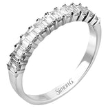This 18K white gold band features .80cttw white baguette diamonds.