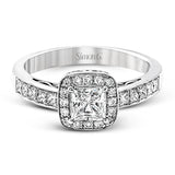 This lovely contemporary white gold engagement ring is set with .34 ctw of glistening princess cut white diamonds and .13 ctw of round cut white diamonds.
