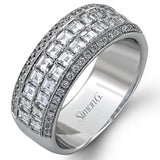 The perfect band for a special celebration, this anniversary ring features 1.53 ctw. square baguettes lined by a row of round diamonds 0.27 ctw.