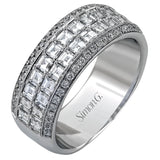 The perfect band for a special celebration, this anniversary ring features 1.53 ctw. square baguettes lined by a row of round diamonds 0.27 ctw.