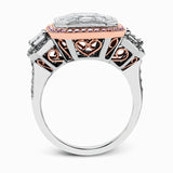 This impressive white and rose gold ring is set with a 3.0 ctw mosaic of white diamonds accented by .45 ctw round cut white diamonds, 1.06 emerald cut white diamonds, and .30 pink diamonds.