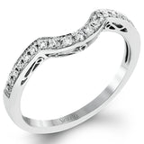 With a beautiful halo surrounding the center stone, this lovely white gold engagement ring is set with 1.14 ctw of shimmering princess cut white diamonds and .20 ctw round cut white diamonds.