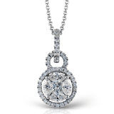 With its double circle design, this elegant white gold pendant is accented with .10 ctw princess cut white diamonds, .19 ctw round cut white diamonds, and .30 ctw marquise cut white diamonds.