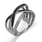 Featuring an intricately entwined contemporary design, this tri-tone ring is highlighted by .42 ctw of round cut white diamonds in rose, yellow, and white gold.