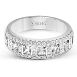 These stunning 18k white gold band contains .93 ctw of princess cut white diamonds as well as .44 ctw of round white diamonds.
