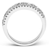 These stunning 18k white gold band contains .93 ctw of princess cut white diamonds as well as .44 ctw of round white diamonds.