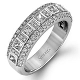 These stunning 18k white gold band contains .93 ctw of princess cut white diamonds as well as .44 ctw of round white diamonds.