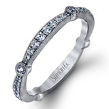 Featuring a dazzling contemporary design, this elegant white gold engagement ring and wedding band set is accented by .59 ctw of round cut white diamonds.