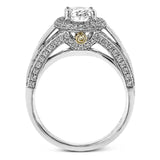 This lovely 18k white gold engagement ring design is created for an elegant oval center stone and features .77 ctw of white diamonds accented by a small touch of .03 ctw of yellow diamonds.