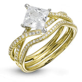 This dramatic white gold engagement ring and wedding band set are highlighted by .23 ctw of dazzling round cut white diamonds in a distinctive modern twist design.