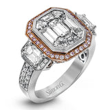 This brilliant white and rose gold contemporary ring is accentuated by a 2.0 ctw center mosaic of white diamonds, complemented by .30 ctw round cut white diamonds, .77 ctw emerald cut white diamonds, and .18 ctw round pink diamond accents.