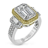 This brilliant white and rose gold contemporary ring is accentuated by a 2.0 ctw center mosaic of white diamonds, complemented by .30 ctw round cut white diamonds, .77 ctw emerald cut white diamonds, and .18 ctw round pink diamond accents.