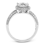 This vintage-inspired 18k white gold engagement ring is the perfect design for princess cut center stone because it has a detailed square shaped halo. The entire ring is set with .62 ctw of white diamonds.