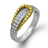 The eye-catching buckle design of this contemporary white and rose gold ring is highlighted by .65 ctw of round cut white diamonds.