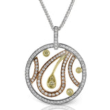 The distinctive circular design of this classic tri-tone pendant is highlighted .61 ctw round cut white diamonds and .15 round cut yellow diamond accents in an exquisite floral pattern.