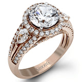 Reflecting a charming vintage design, this dazzling white gold engagement ring features .63 ctw of round cut white diamonds and .51 ctw of pear shaped white diamonds.