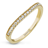 Reflecting a charming vintage design, this dazzling white gold engagement ring features .63 ctw of round cut white diamonds and .51 ctw of pear shaped white diamonds.