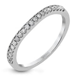 Reflecting a charming vintage design, this dazzling white gold engagement ring features .63 ctw of round cut white diamonds and .51 ctw of pear shaped white diamonds.