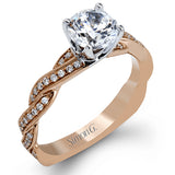 This exquisite white contemporary engagement ring features a delicate twist design on the band accented by .22 ctw of sparkling round cut white diamonds.