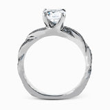 This exquisite white contemporary engagement ring features a delicate twist design on the band accented by .22 ctw of sparkling round cut white diamonds.