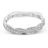 This impressive white gold band is accented by a remarkable twist design set with .24 ctw of dazzling round cut white diamonds.