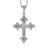This delicately styled classic white gold cross is beautifully set with .47 ctw of glistening round cut white diamonds accents.