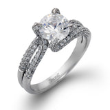 This lovely engagement ring showcases .59 ctw of white diamonds in a unique design.