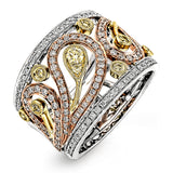 This vintage inspired tri-tone band features a delicate floral design accented by .55 ctw round cut white diamonds and .20 ctw round cut yellow diamonds set in lovely rose, yellow, and white gold.