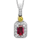 This impressive white and yellow gold classic pendant features an emerald cut ruby accented by .12ctw round white diamonds and a .02ct round cut yellow diamonds.