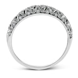 This intricate band has a floral, nature-inspired design and contains .32 ctw of white diamonds.
