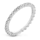 Featuring a modern stackable design, this band white gold is accented by .40 ctw round cut white diamonds.