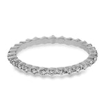 Featuring a modern stackable design, this band white gold is accented by .40 ctw round cut white diamonds.