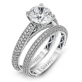 This classically styled white gold engagement ring is set with 1.30 ctw of shimmering white diamonds in a stunning design.
