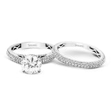 This classically styled white gold engagement ring is set with 1.30 ctw of shimmering white diamonds in a stunning design.
