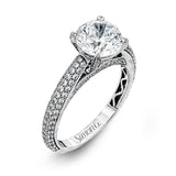 This classically styled white gold engagement ring is set with 1.30 ctw of shimmering white diamonds in a stunning design.