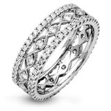 This wonderful 18k gold band features .87 ctw of white diamonds set into an intricate, three layer design.  It can be worn on its own as a fashion statement or function as a wedding band.