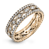 This wonderful 18k gold band features .87 ctw of white diamonds set into an intricate, three layer design.  It can be worn on its own as a fashion statement or function as a wedding band.