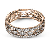 This wonderful 18k gold band features .87 ctw of white diamonds set into an intricate, three layer design.  It can be worn on its own as a fashion statement or function as a wedding band.