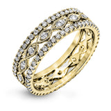 This wonderful 18k gold band features .87 ctw of white diamonds set into an intricate, three layer design.  It can be worn on its own as a fashion statement or function as a wedding band.