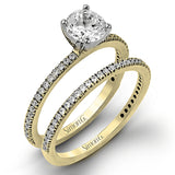 The classic, streamlined design of this 18k white gold wedding set is accented by .30 ctw of sparkling white round brilliant diamonds.