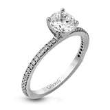 The classic, streamlined design of this 18k white gold wedding set is accented by .30 ctw of sparkling white round brilliant diamonds.
